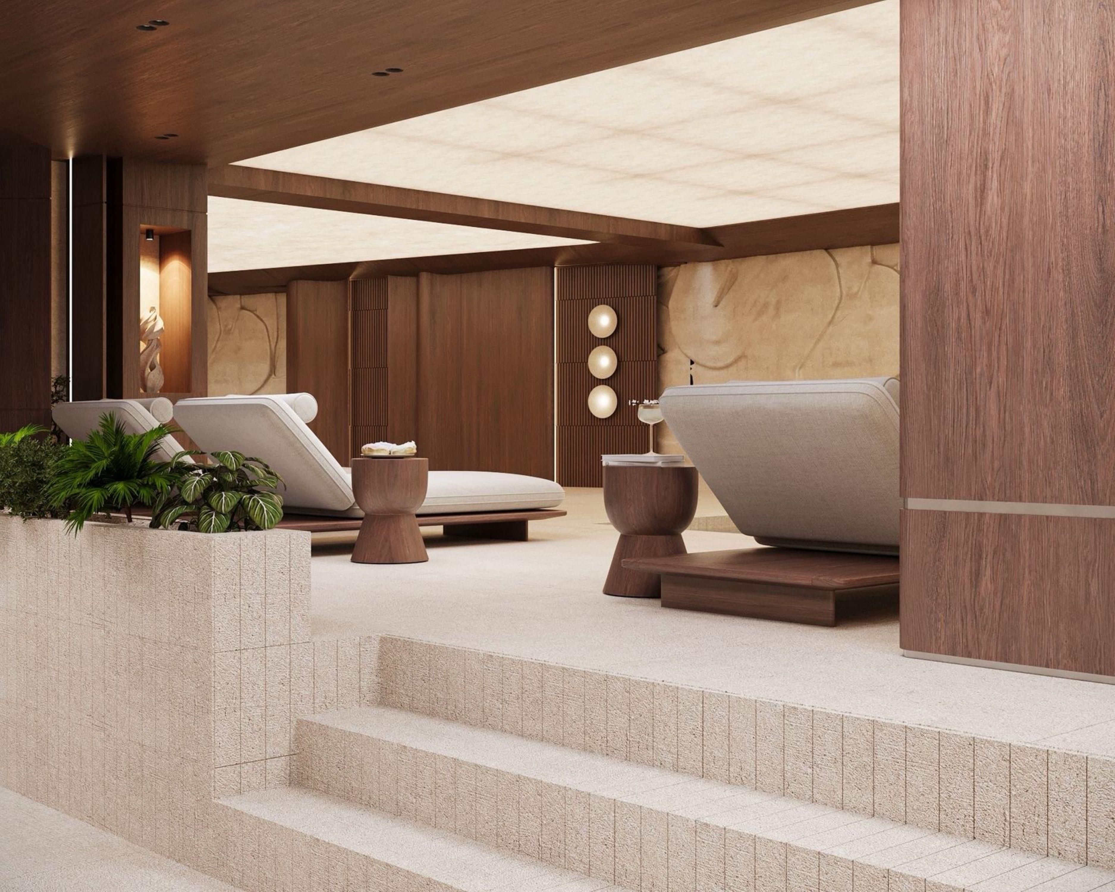 Un espace spa moderne comprenant un banc en pierre, une table de massage et un petit tabouret en bois.