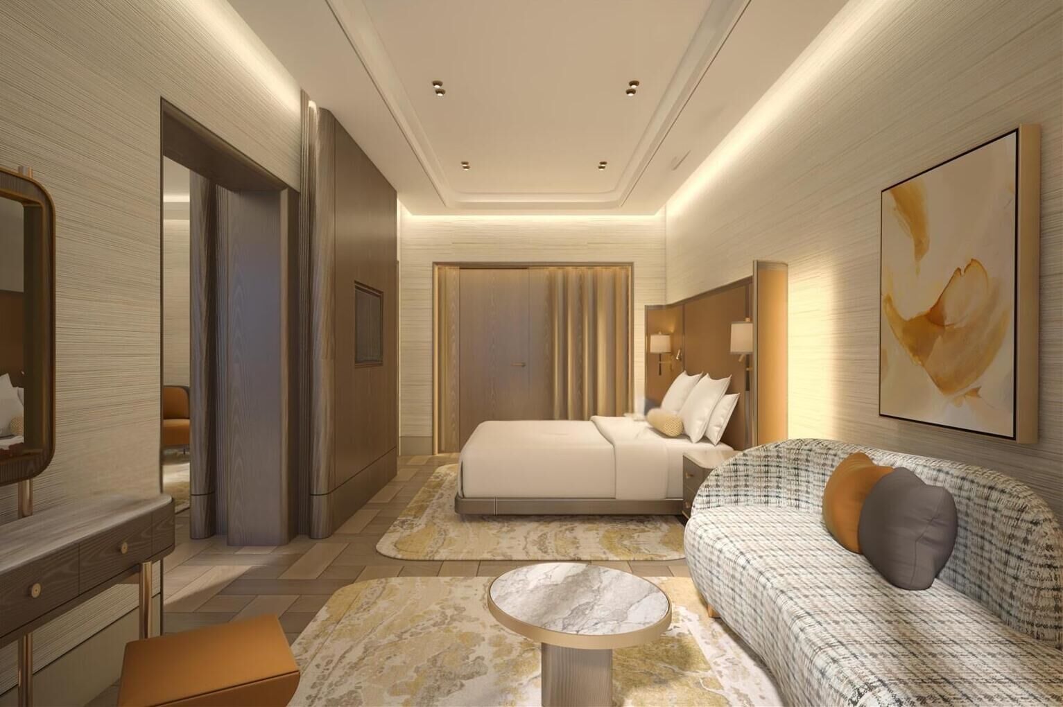 A modern hotel room with a large bed, a sitting area with a sofa and armchairs, a small round table, and a large abstract painting on the wall.