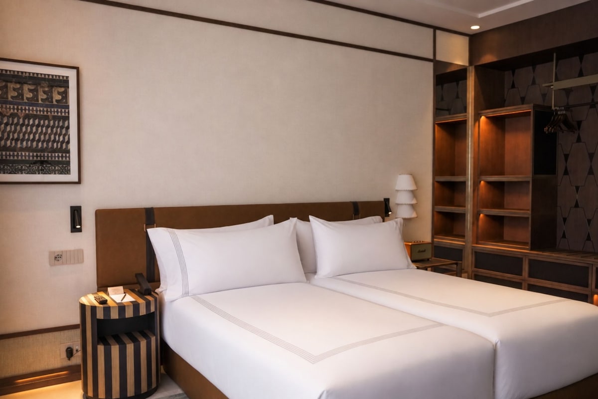 Premium bedding, down comforters, minibar, in-room safe