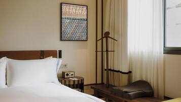 Premium bedding, down comforters, minibar, in-room safe