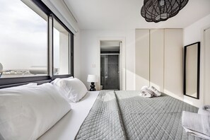 1 غرفة نوم ومكواة/لوح كي وخدمة الإنترنت وملاءات أسرّة