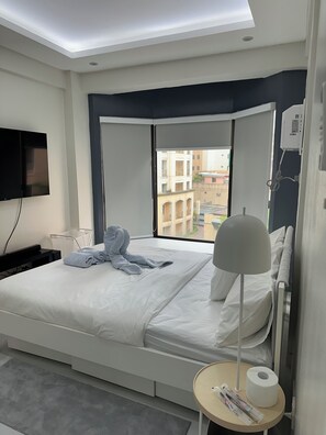 1 bedroom, iron/ironing board, WiFi, bed sheets - 1BR End Unit with 1.5 Bath, Private Balcony, Pool Access,Designated Free Parking (Metro Manila)
