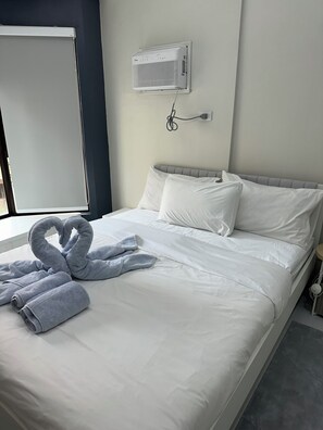 1 bedroom, iron/ironing board, WiFi, bed sheets - 1BR End Unit with 1.5 Bath, Private Balcony, Pool Access,Designated Free Parking (Metro Manila)