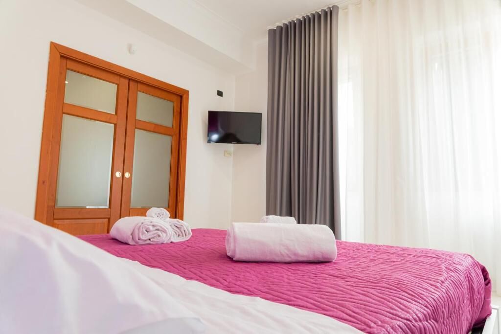 Triple Room, Balcony, City View | In-room safe, free WiFi