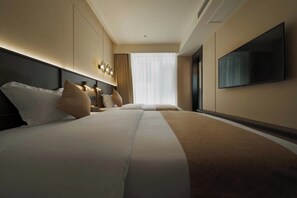 Standard Triple Room, City View | Living area | 50-inch TV with satellite channels - Good Night Hotel (Zhangjiajie)