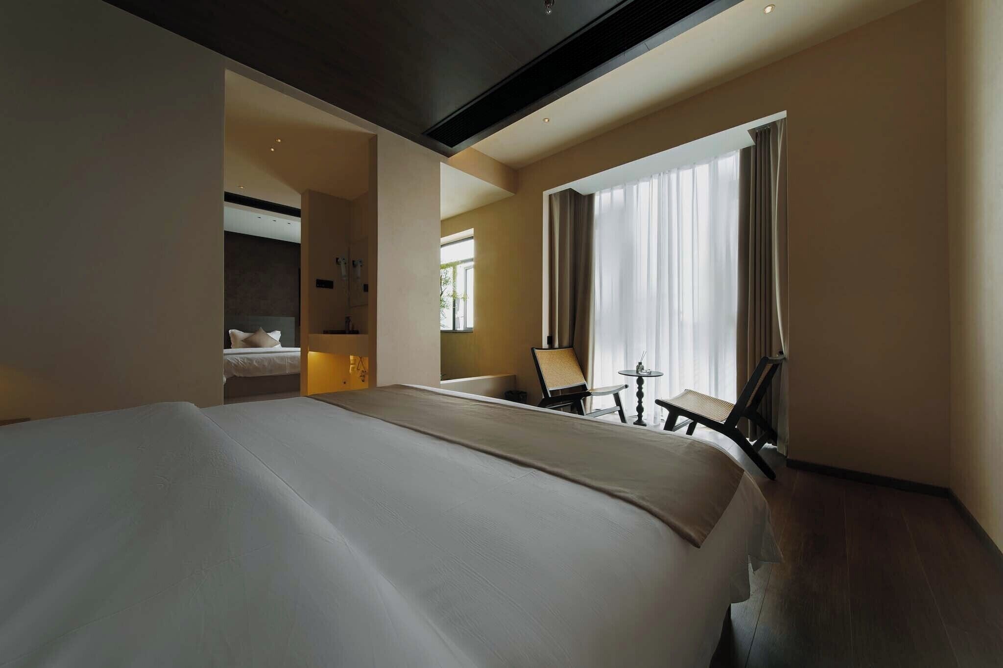 Luksus-suite - byudsigt | Opholdsområde | 50-tommers tv med satellitkanaler