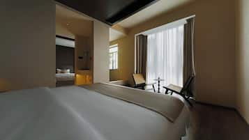 Luksus-suite - byudsigt | Opholdsområde | 50-tommers tv med satellitkanaler