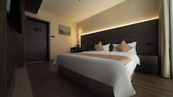 Superior Double Room, City View | Living area | 50-inch TV with satellite channels