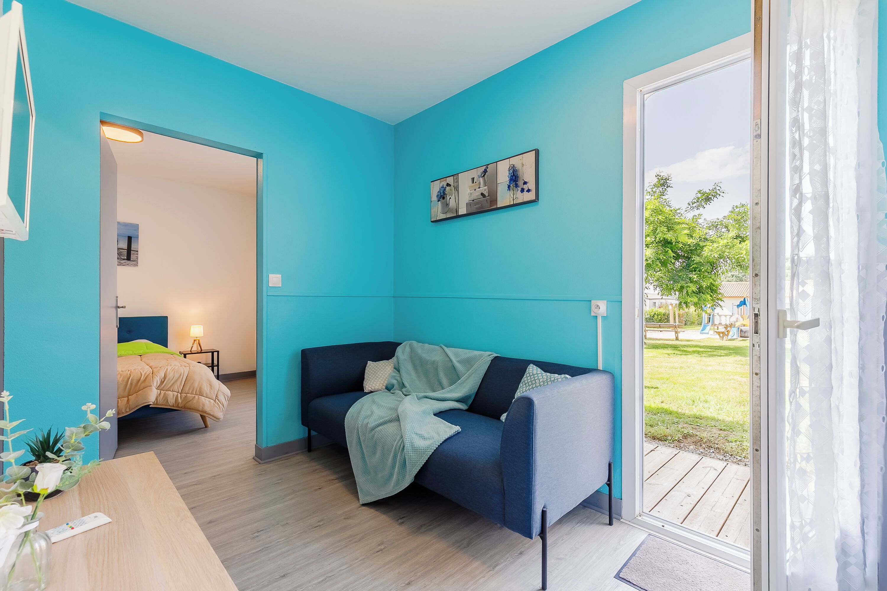Maison Premium, 2 chambres, non-fumeurs, terrasse | Coin séjour | Table de tennis de table, livres