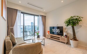 Luxury Apartment, 2 Bedrooms, Kitchen, City View | Living area - Honey The Opera Luxury Residence (Thu Thiem)