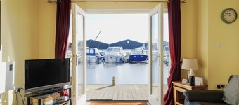 Swift Cottage, Norfolk Broads riverside holiday rental with boat mooring