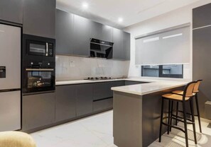 Private kitchen - The Alcove -One Bedroom Apartment in Lagos,Nigeria (Lekki)