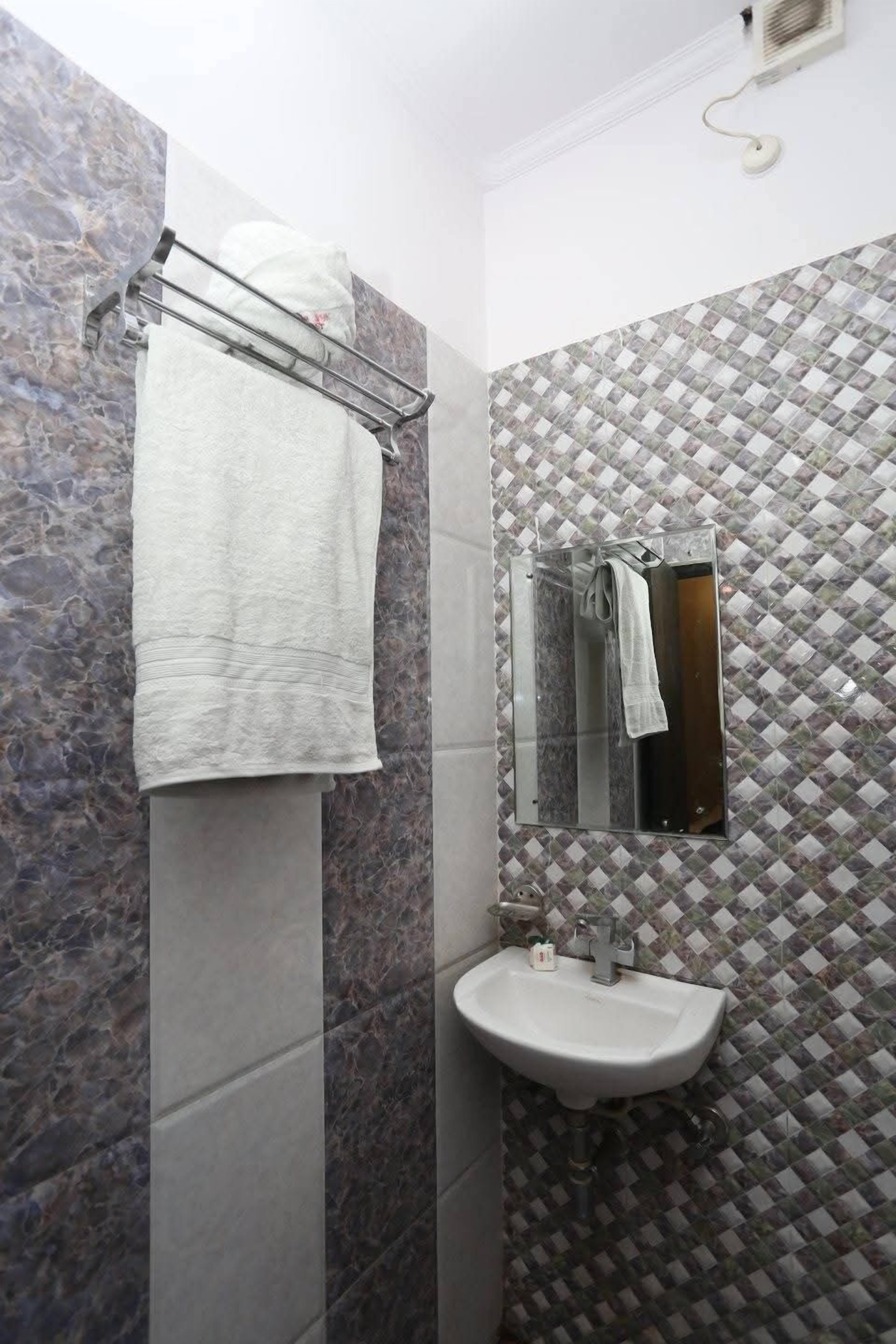 Ducha, toallas, jabón, shampoo