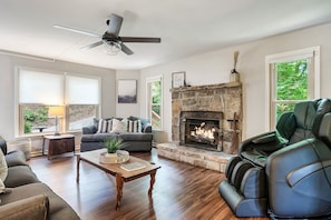 Signature Cabin, 3 Bedrooms, Hot Tub | Living room | 32-inch Smart TV with digital channels, fireplace - Emerald Spring's Cabin (Sevierville)