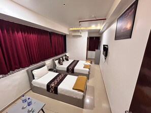 Unclassified image, 3 of 17, button - Hotel Nirali Rooms - Nexus Hospitality (Surat)