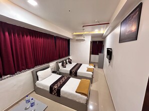 Unclassified image, 2 of 17, button - Hotel Nirali Rooms - Nexus Hospitality (Surat)