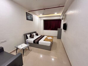 Unclassified image, 4 of 17, button - Hotel Nirali Rooms - Nexus Hospitality (Surat)
