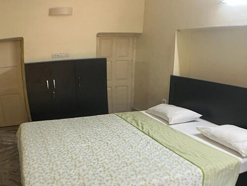 Kuakhai -Ground floor garden view double bedroom in Bhubaneswar