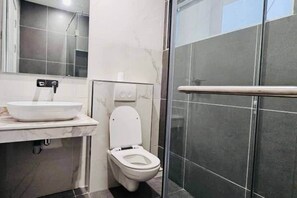 Shower, bidet, toilet paper - Haven| Two Bedroom Apartment in Lekki Phase 1. (Lekki)