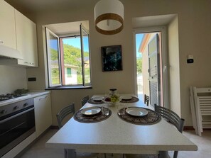 Fridge, oven, cookware/dishes/utensils - 'The River by Interhome (Castagnelo)