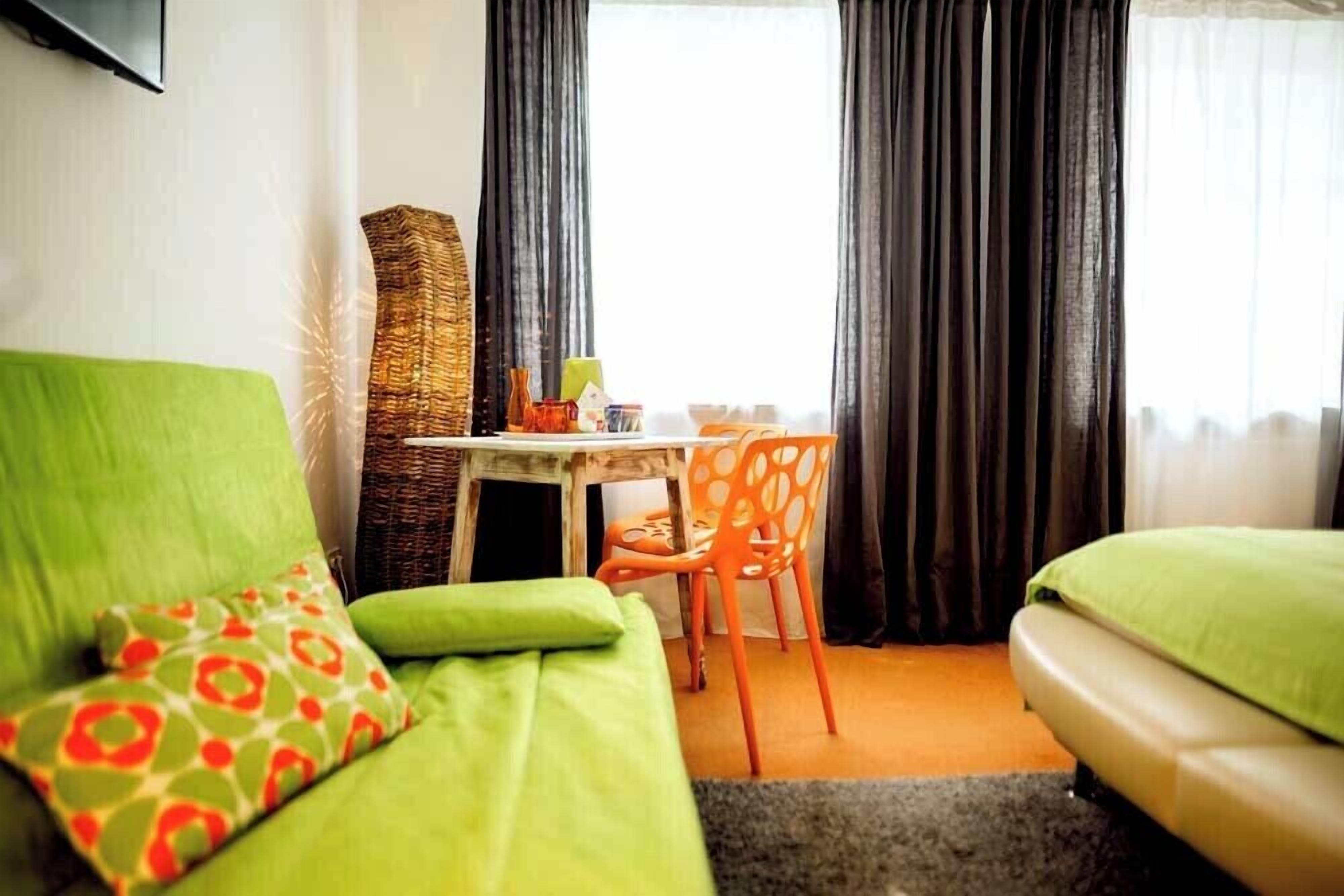 Standard-Dreibettzimmer, Haustiere gestattet, Stadtblick | Kostenloses WLAN, Bettwäsche