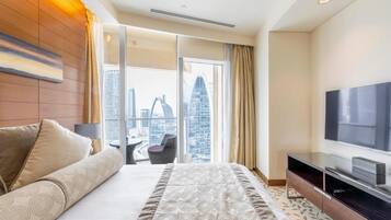 Deluxe Apartment, Balcony, City View | In-room safe, blackout drapes, soundproofing, iron/ironing board