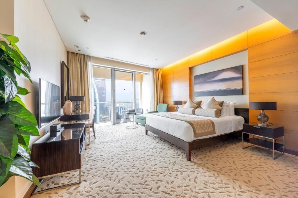Deluxe Apartment, Balcony, City View | In-room safe, blackout curtains, soundproofing, iron/ironing board