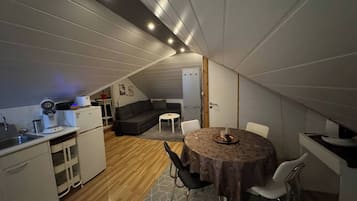 Appartement, 1 chambre | Salle Ă manger