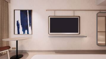 Minibar, coffres-forts dans les chambres, bureau, rideaux occultants