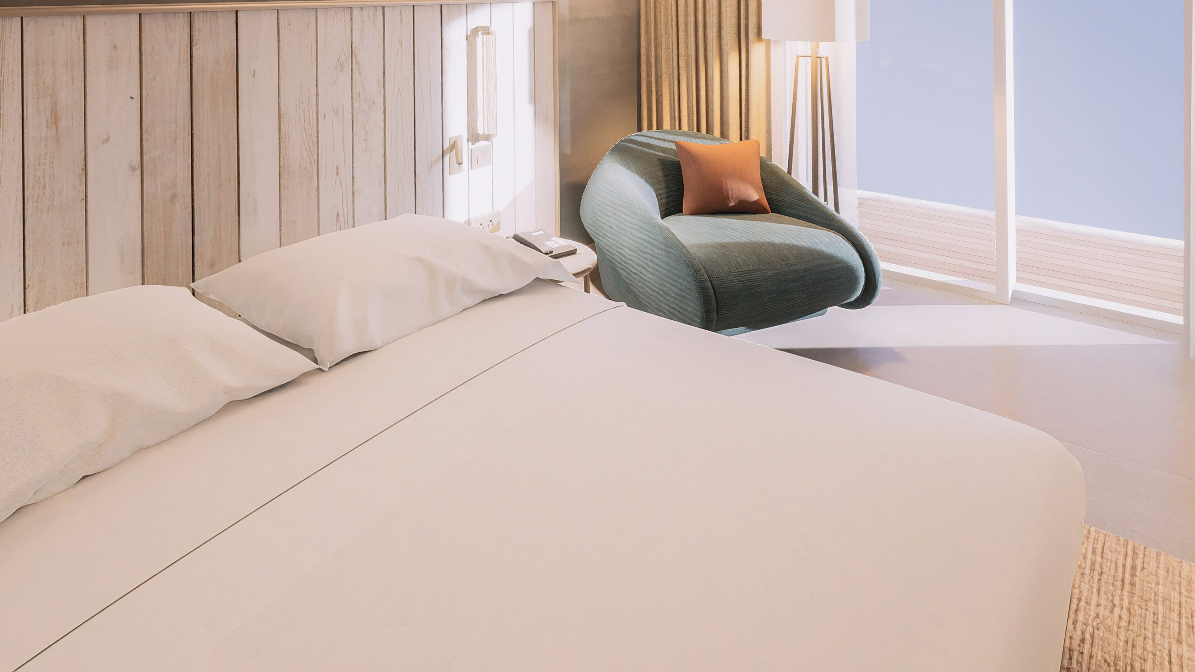Una camera da letto con un letto grande, una sedia e una finestra.