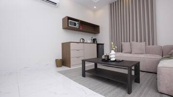 Apartamento Deluxe, no fumadores, baño privado | Zona de estar