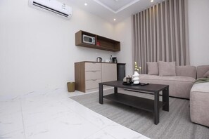 Apartamento Deluxe, no fumadores, baño privado | Zona de estar
