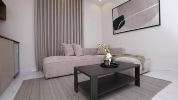 Apartamento Deluxe, no fumadores, baño privado | Zona de estar