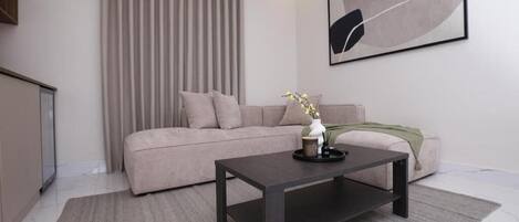 Appartement Deluxe, non-fumeur, salle de bains privée | Coin séjour