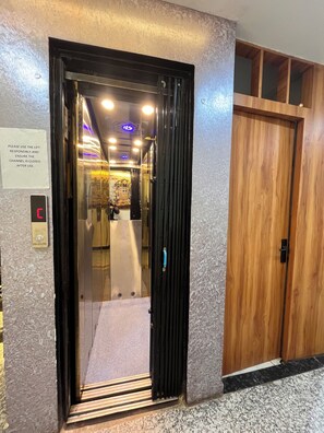 Ảnh chưa phân loại, 2 trong số 21 ảnh, nút