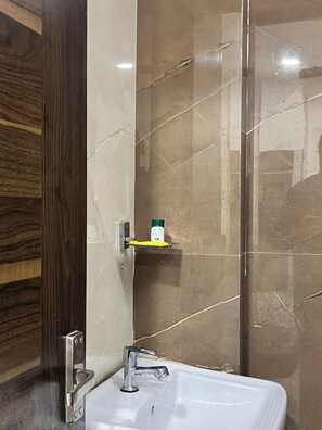 Double Room | Bathroom | Shower, free toiletries, towels, soap