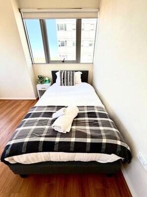 2 dormitorios, tabla de planchar con plancha, wifi y ropa de cama