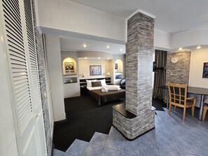 Standard Studio | Living area | 80-cm LCD TV with cable channels - Coposu Residence Apartments (Bucharest)