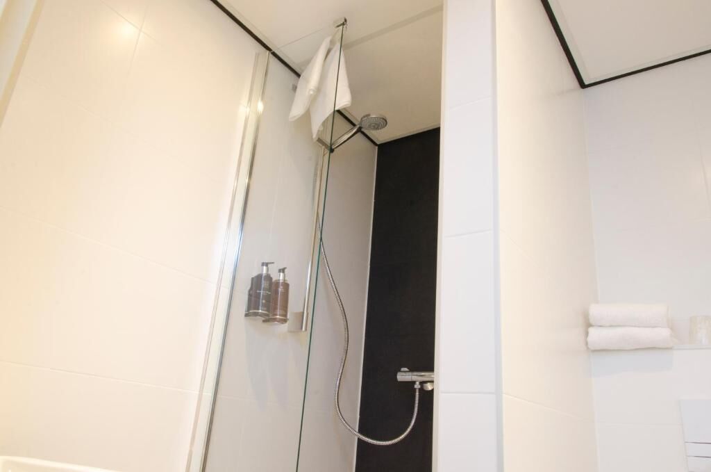 Shower, towels, soap, shampoo