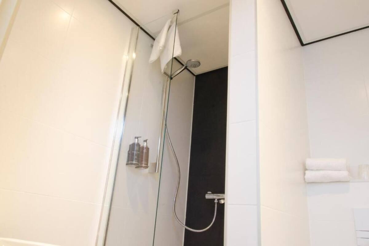 Shower, towels, soap, shampoo