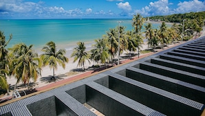 A beach view with palm trees, a clear sky, and a tiled pathway. - Unity #423 - Elegance by the sea by Carpediem (João Pessoa)