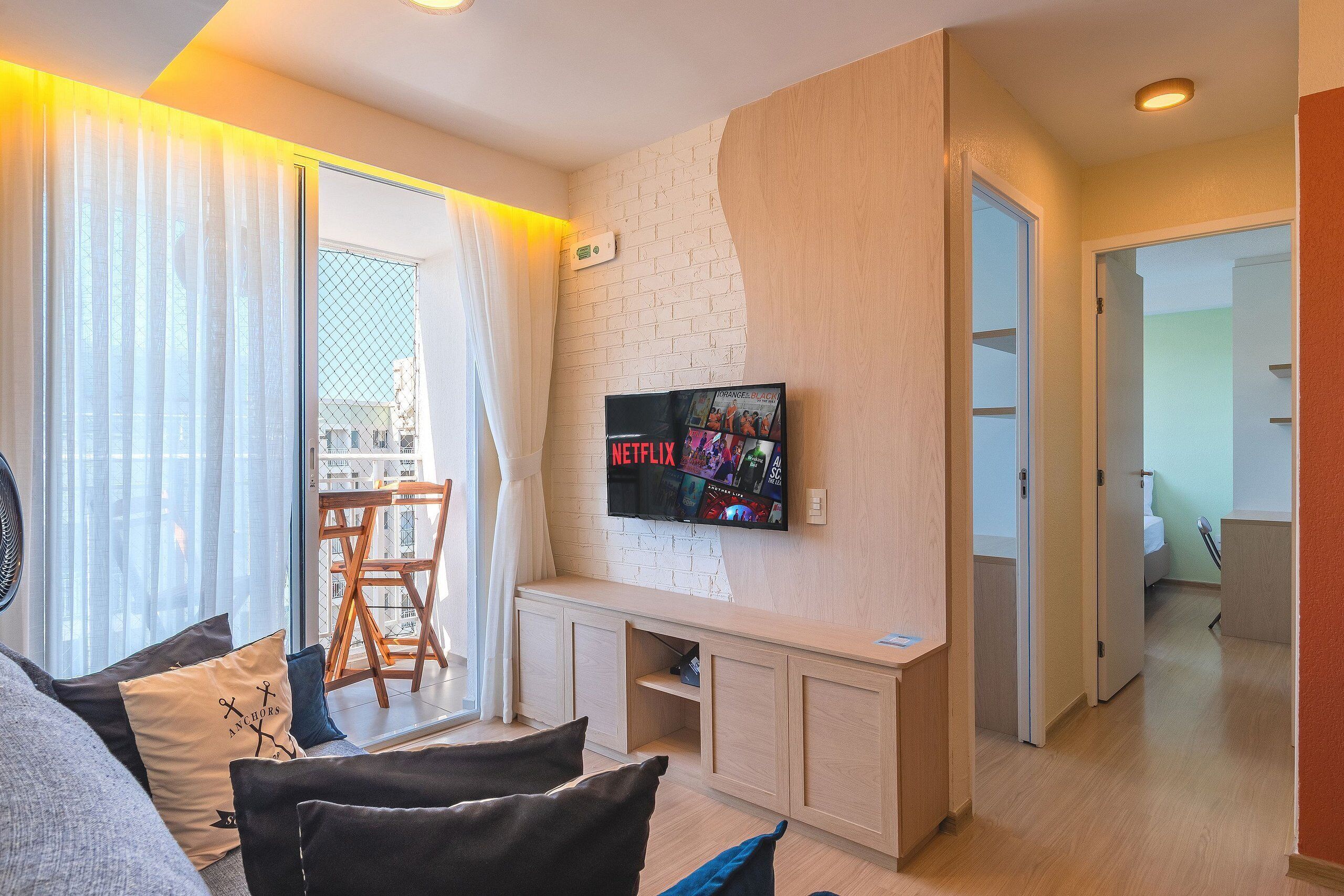 Apartamento básico | Área de estar | TV