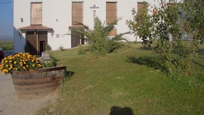 A white building with a sign reading "El Patriarcal". - Moriles Traditional Farmhouse for 8 (Moriles)