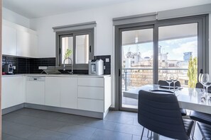 Appartement, uitzicht op tuin | Dineren