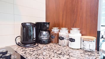 Suite, Balcony, City View | Coffee and/or coffee maker
