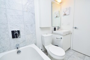Suite, Balcony, City View | Bathroom | Free toiletries, hair dryer, towels, soap