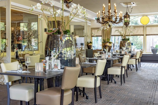 Gather for cocktails and conversation in a refined dining space.