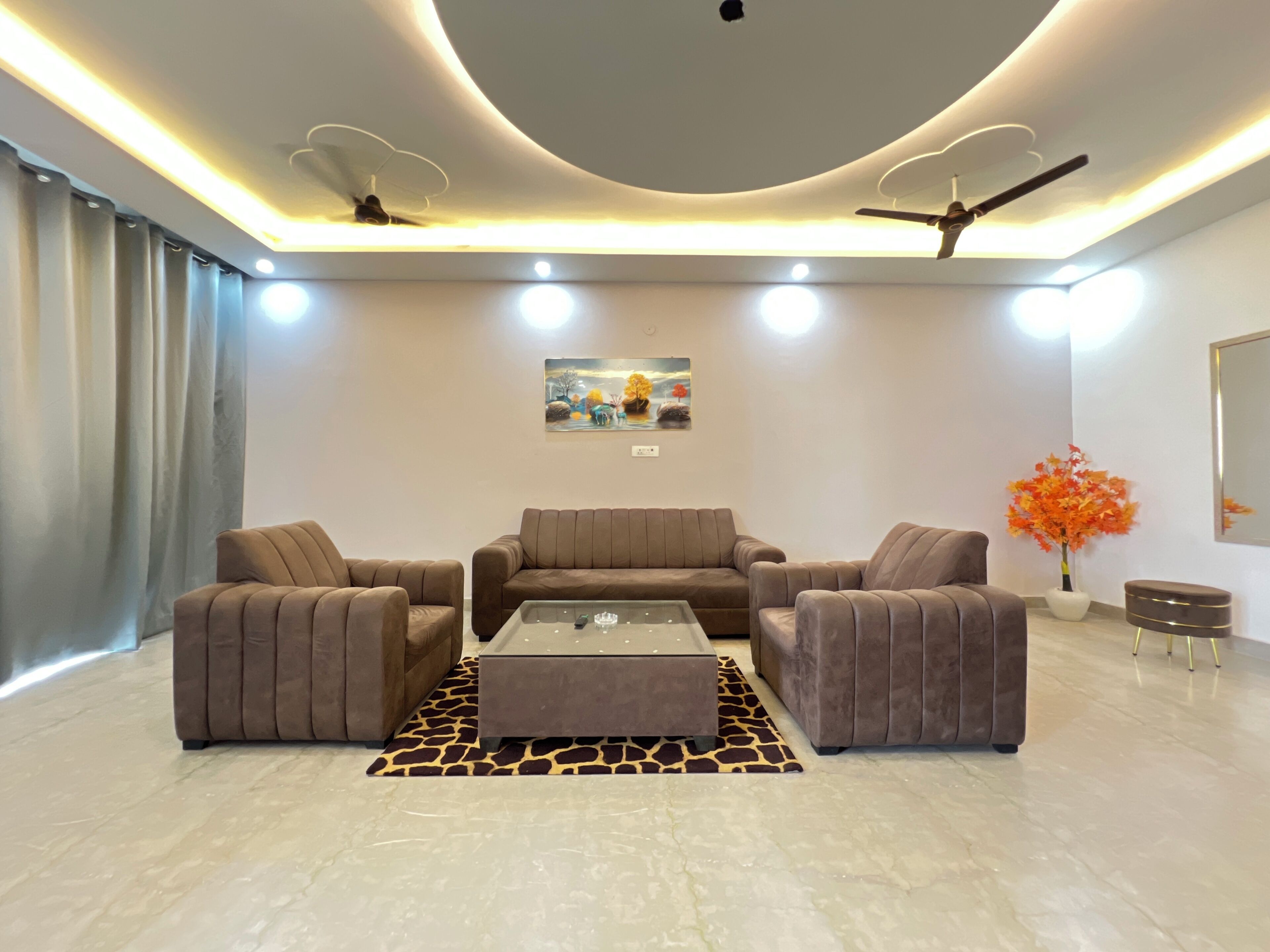 Deluxe Apartment, Balcony, City View | Living area | 43-inch LED TV with digital channels