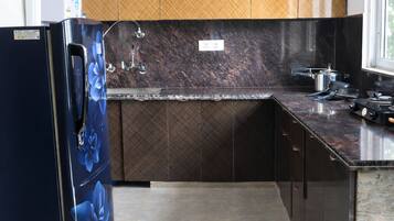 Fridge, oven, cookware/dishes/utensils