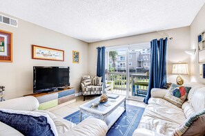 TV, offices - Convenient condo near beach with pool, balcony, & W/D - snowbird-friendly (Pensacola Beach)